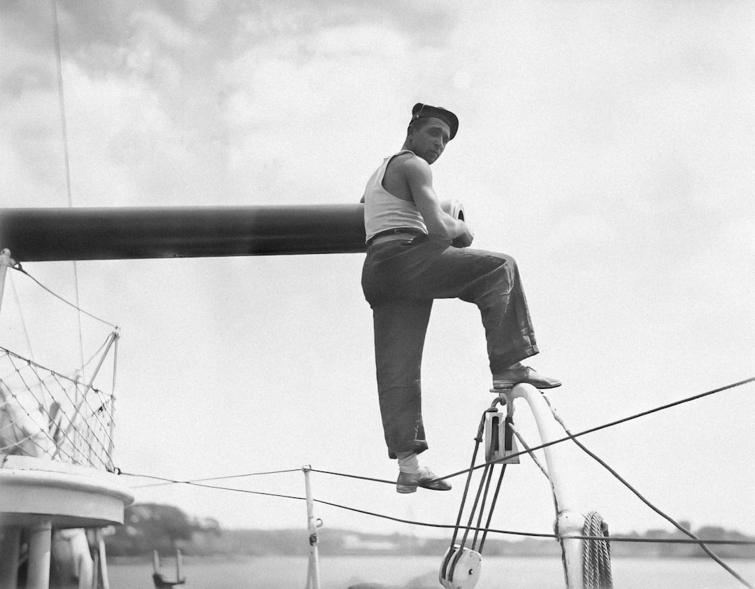 Sailor possibly on board the French warship BELLATRIX in Sydney, 1930-1932 This image possibly depicts a French sailor on board the naval sloop BELLATRIX. The vessel visited Sydney in December 1929, December 1930 and July 1932 and was commanded by Commander Jells, Captain M Bastard and Commandant Constantan respectively. Each time, it docked in Morts Dock in Balmain for its 'annual overhaul' (The Sydney Morning Herald, 3 February 1931). Newspapers provided photographs of French and Pacific Islander sailors and crew at work during each stay in Sydney.
